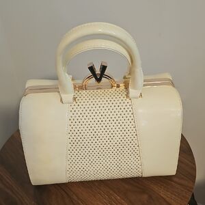 Elegant Cream Handbag with Gold Accents